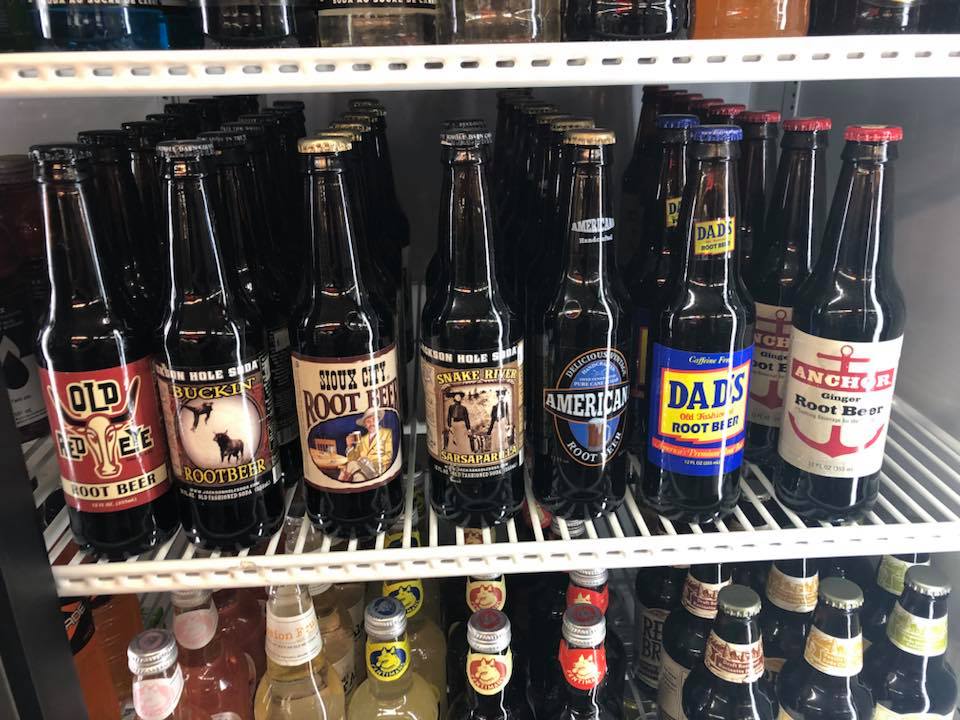 King Drug in Hinton, AB stocks multile old-fashioned bottled drinks, like root beer and ginger ale in their retro-cafe